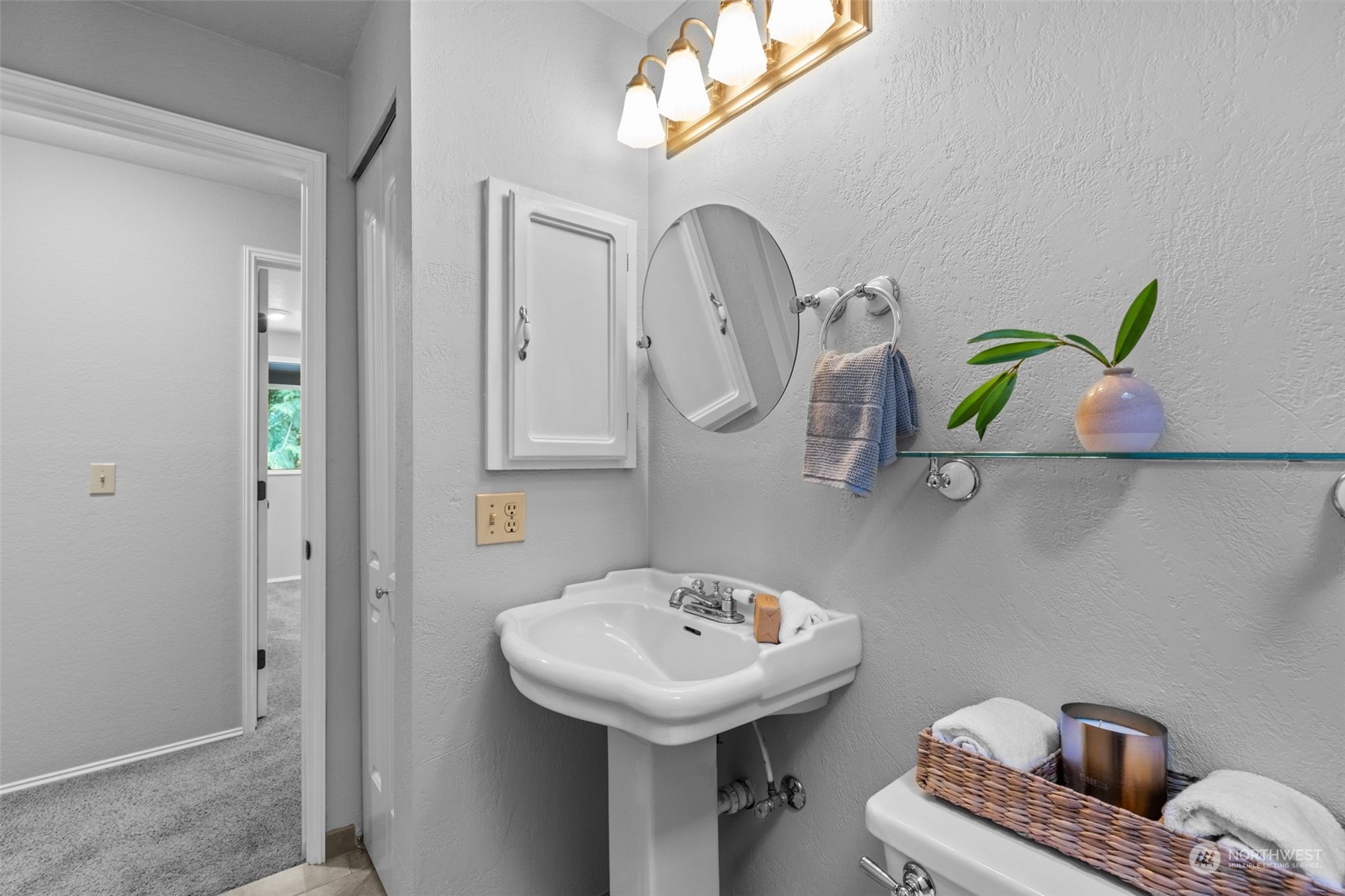 2330 243rd Place Southeast Bothell, WA 98021 - Photo 32 of 40 a bathroom with a sink and a mirror