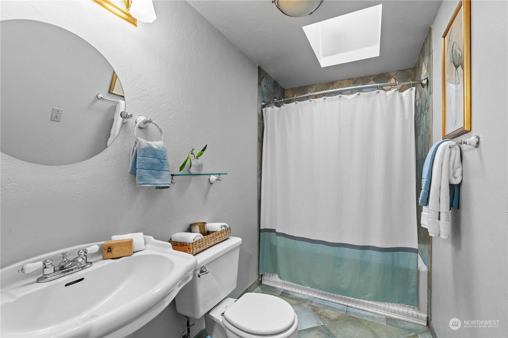 2330 243rd Place Southeast Bothell, WA 98021 - Photo 33 of 40 a bathroom with a sink toilet and shower