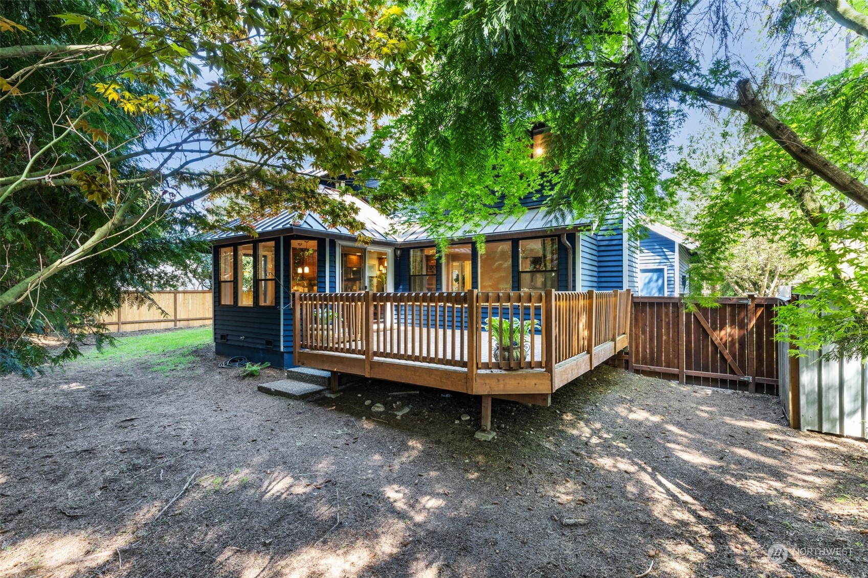 2330 243rd Place Southeast Bothell, WA 98021 - Photo 34 of 40 a view of a house with a yard and deck