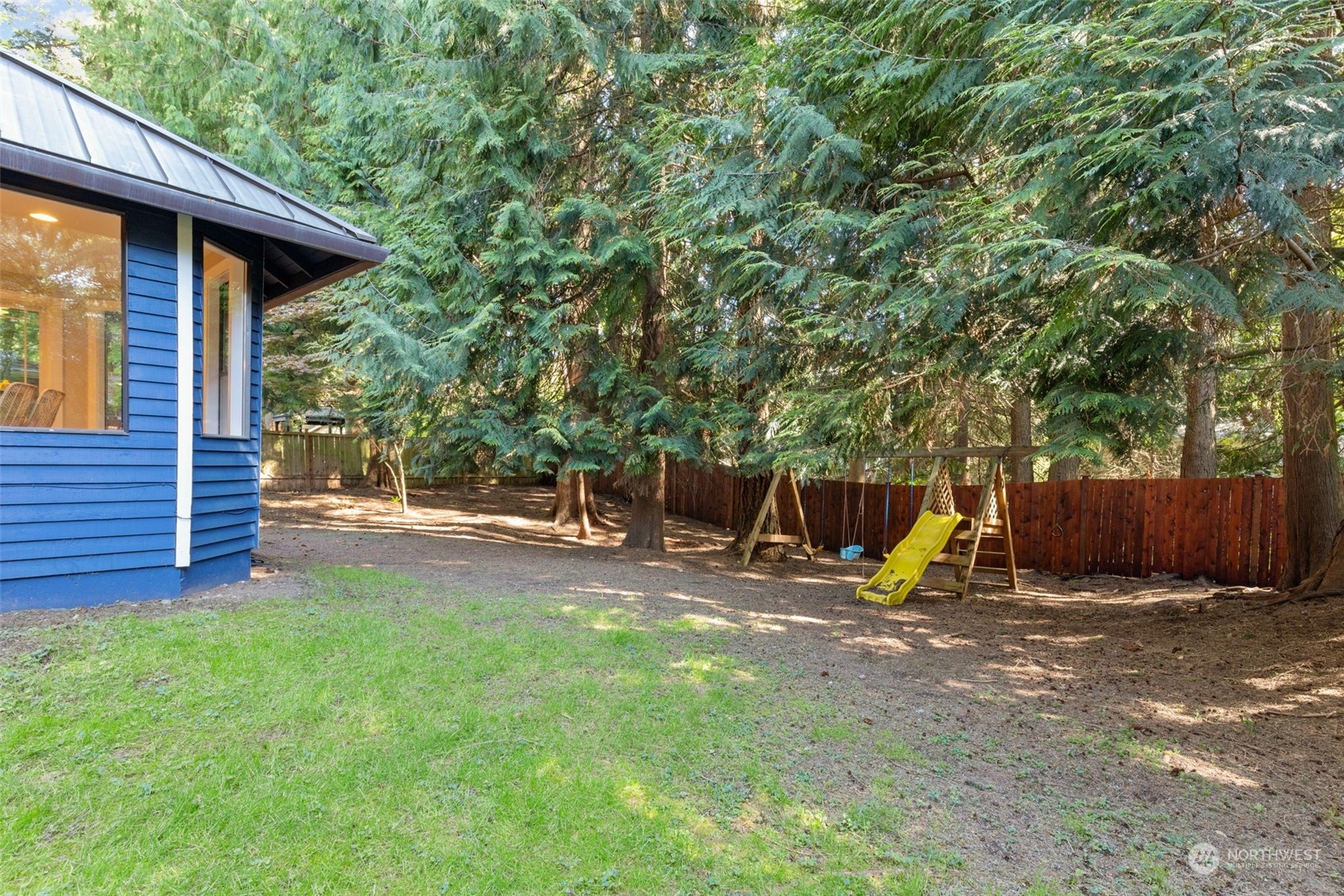 2330 243rd Place Southeast Bothell, WA 98021 - Photo 35 of 40 a view of a backyard with a small cabin