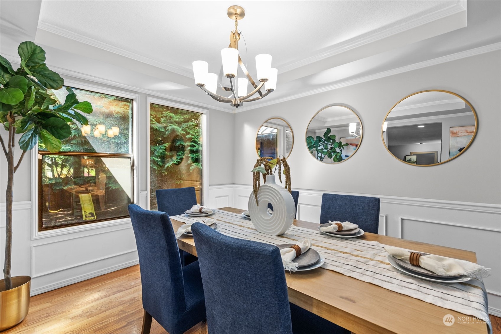 2330 243rd Place Southeast Bothell, WA 98021 - Photo 6 of 40 a view of a dining room with furniture wooden floor and chandelier