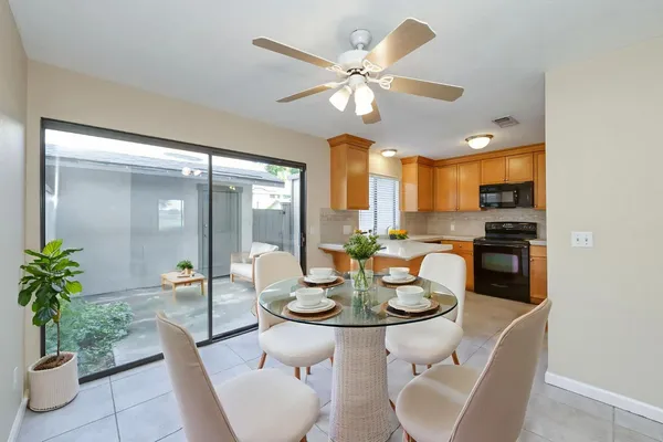 a kitchen with stainless steel appliances a stove sink and microwave