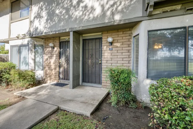 a view of a pathway with a house