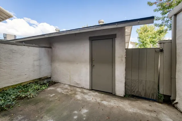 a workspace with furniture and window