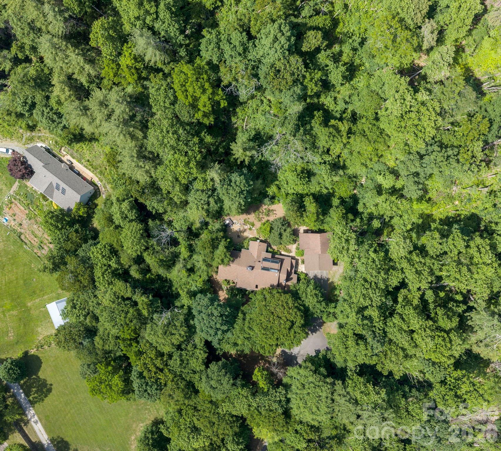 235 Bull Creek Road Asheville, NC 28805 - Photo 44 of 47 an aerial view of a house with a yard