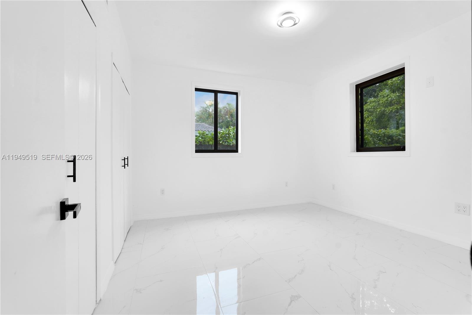 972 Southwest 44th Avenue Miami, FL 33134 - Photo 36 of 53 a view of an empty room with a window