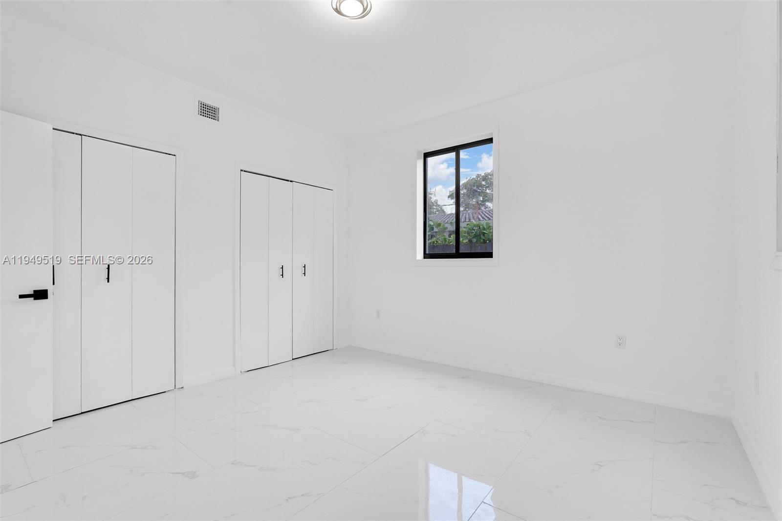 972 Southwest 44th Avenue Miami, FL 33134 - Photo 40 of 53 a view of an empty room with a window