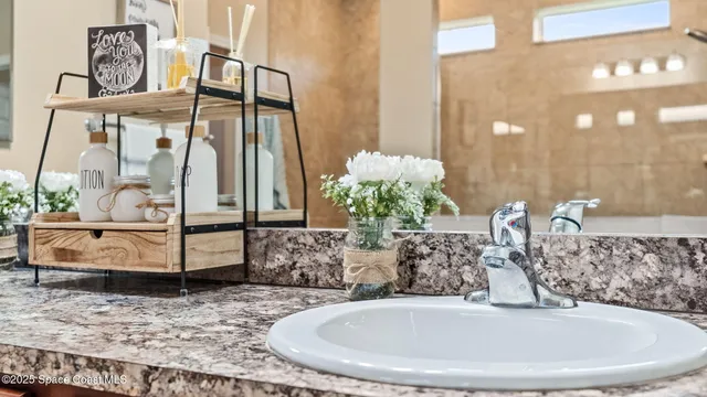 a backyard of a house with seating space