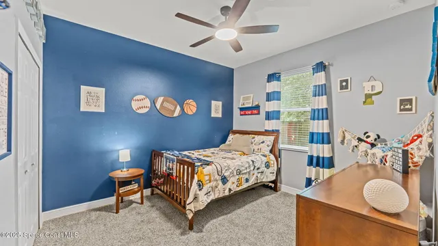 an aerial view of residential building and lake