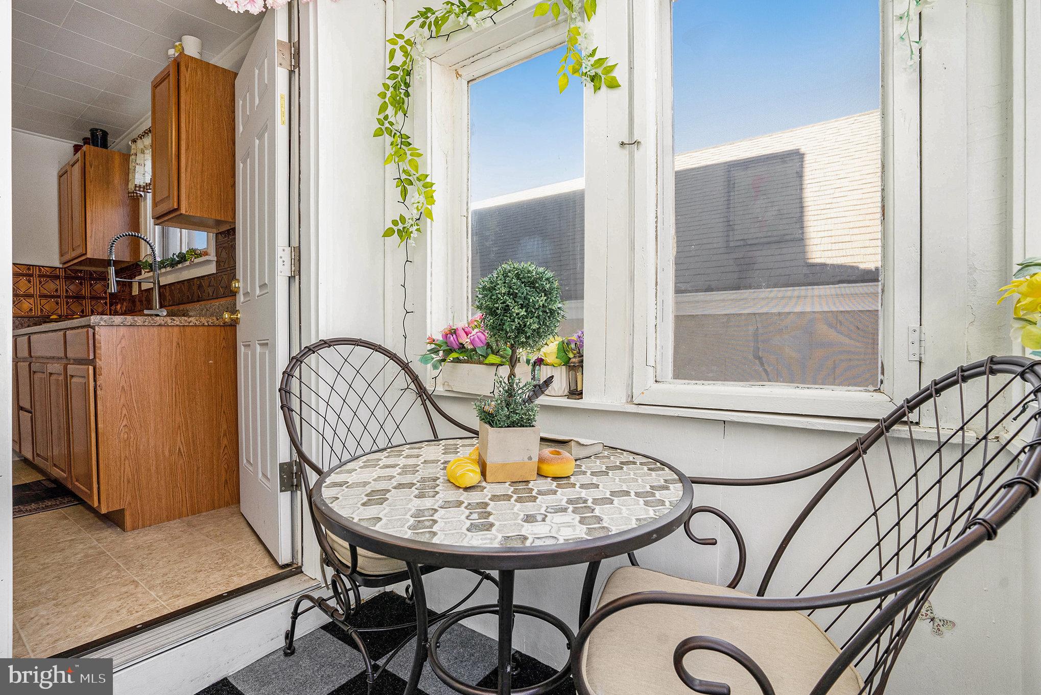 128 Pikeland Avenue Spring City, PA 19475 - Photo 16 of 30 a view of a balcony dining table and chairs