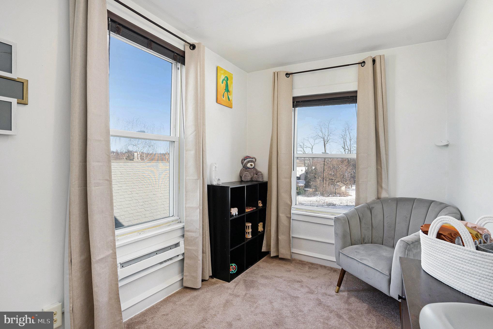 128 Pikeland Avenue Spring City, PA 19475 - Photo 18 of 30 a living room with furniture and a window
