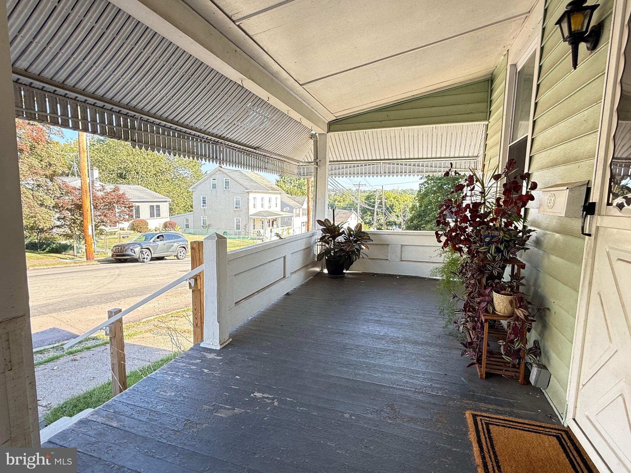 128 Pikeland Avenue Spring City, PA 19475 - Photo 2 of 30 a living room with furniture and a large window
