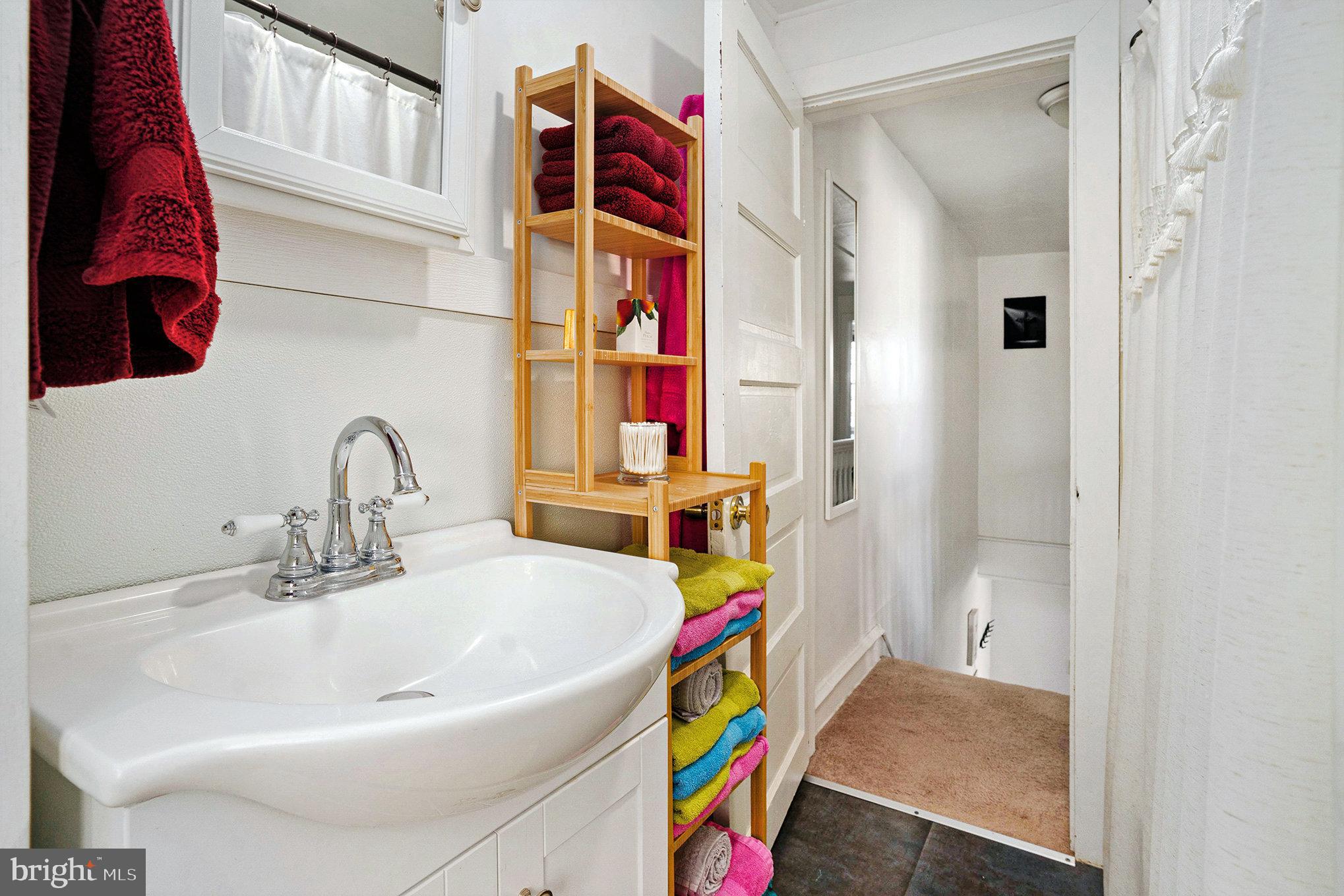 128 Pikeland Avenue Spring City, PA 19475 - Photo 21 of 30 a bathroom with a sink and a bathtub