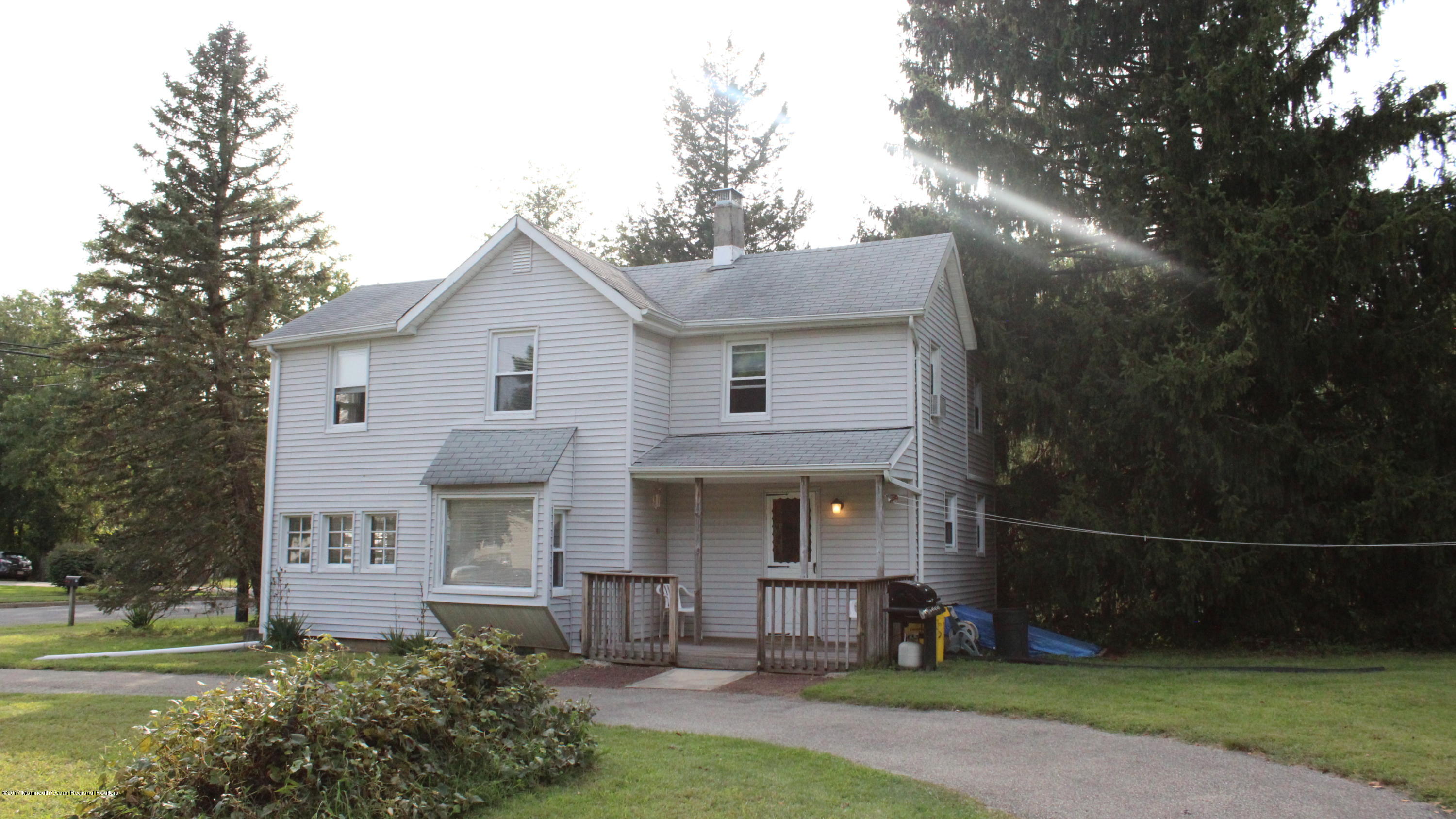 451 Pfister Road Jackson, NJ 08527 - Photo 3 of 25 a front view of a house with garden