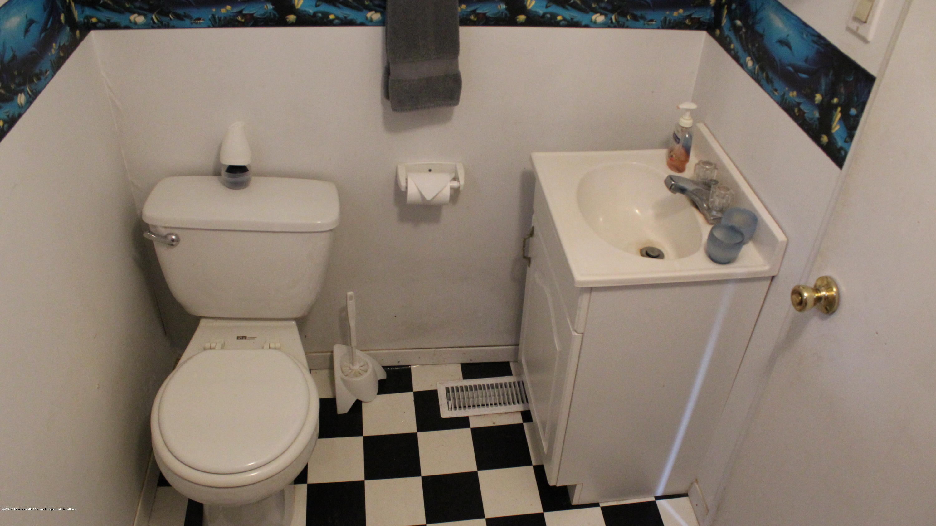 451 Pfister Road Jackson, NJ 08527 - Photo 10 of 25 a bathroom with a sink and a toilet