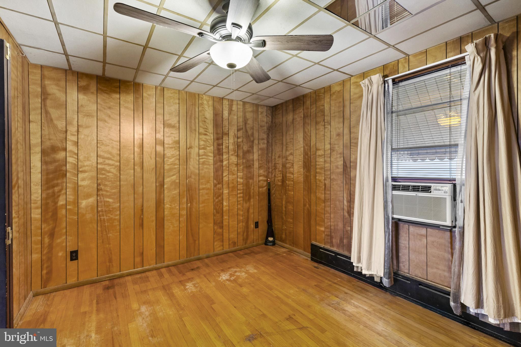 7627 Carson Avenue Baltimore, MD 21224 - Photo 14 of 38 a view of entryway with wooden walls