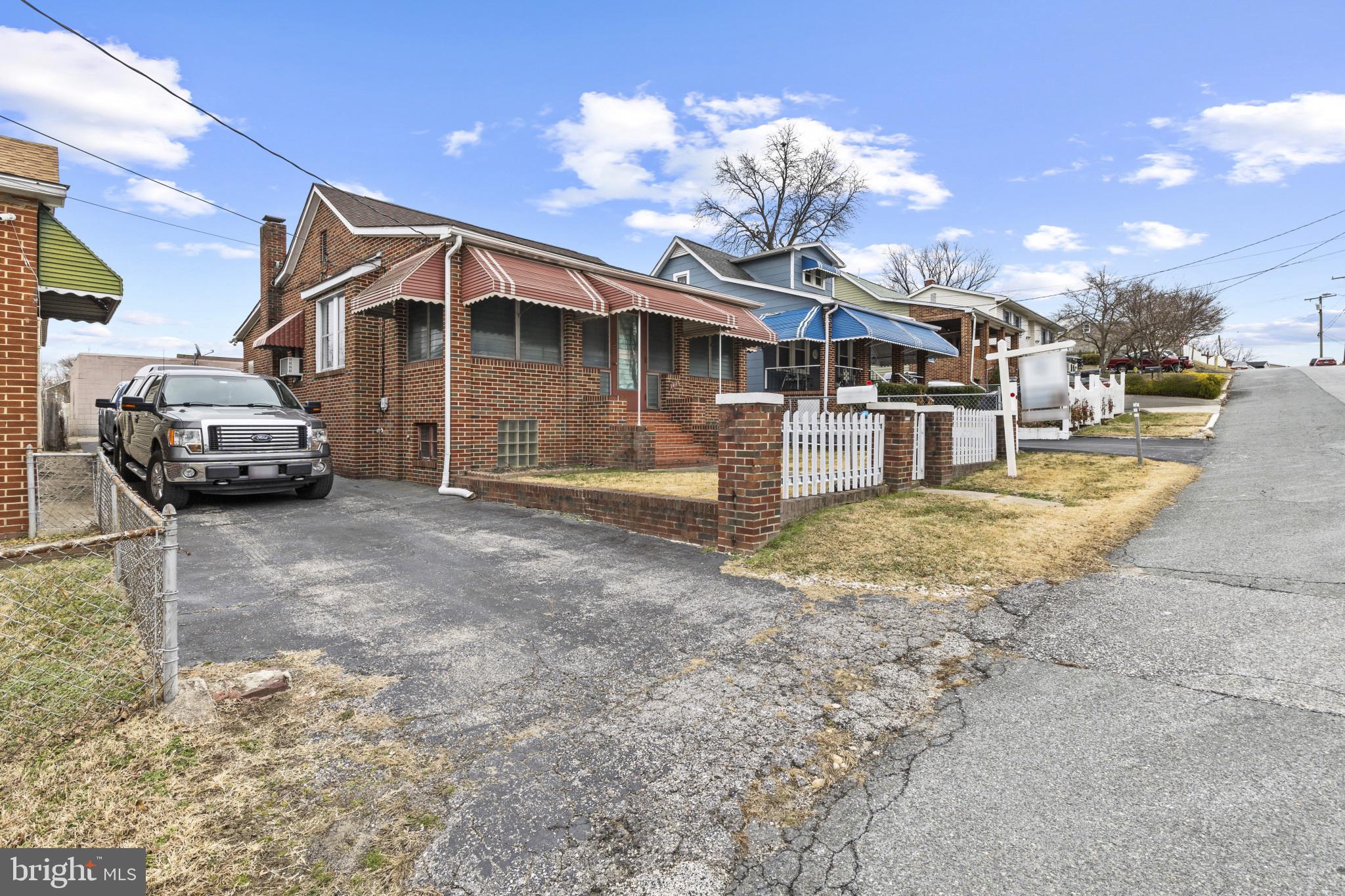 7627 Carson Avenue Baltimore, MD 21224 - Photo 2 of 38 a view of a house with a yard