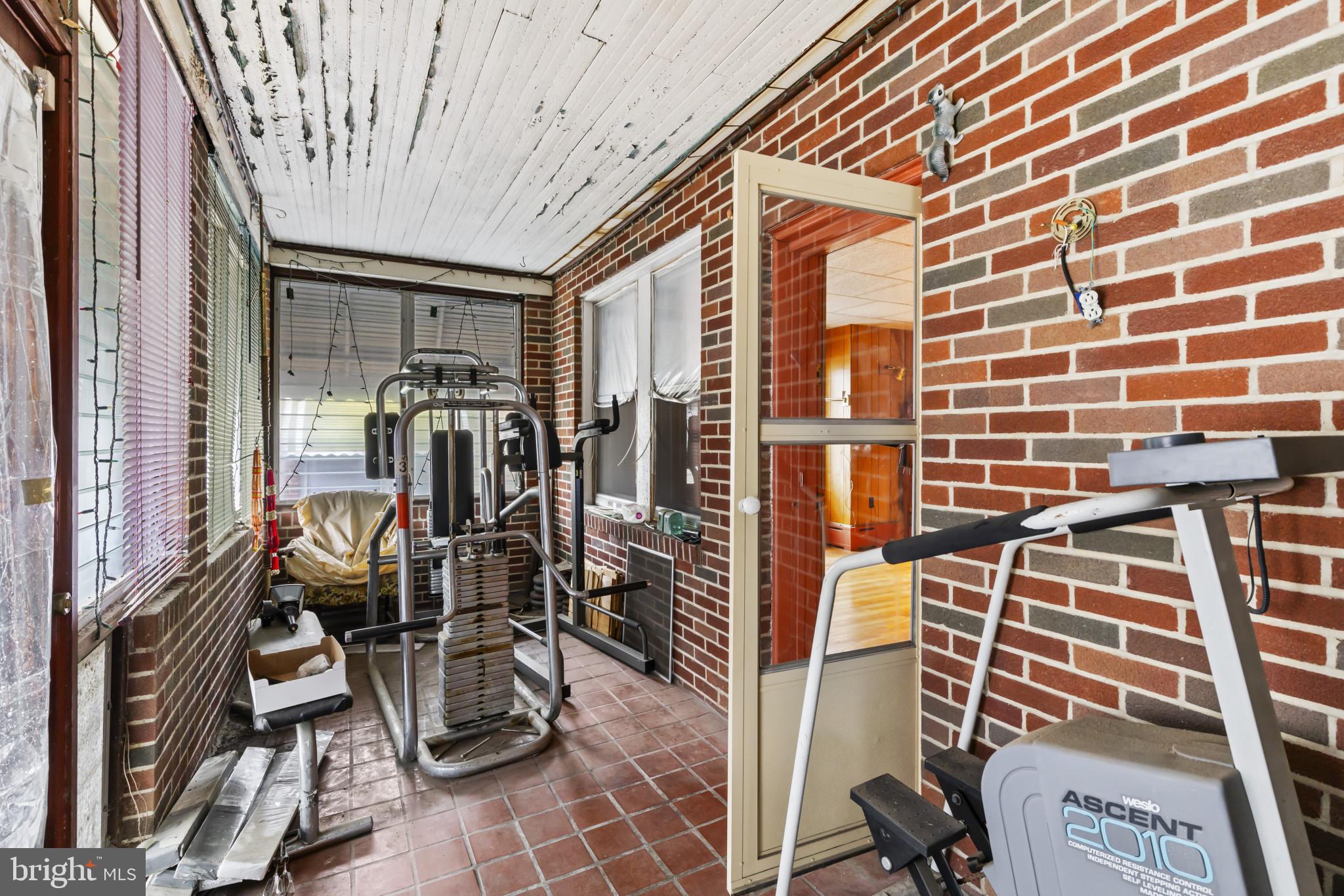 7627 Carson Avenue Baltimore, MD 21224 - Photo 21 of 38 a view of a room with gym equipment