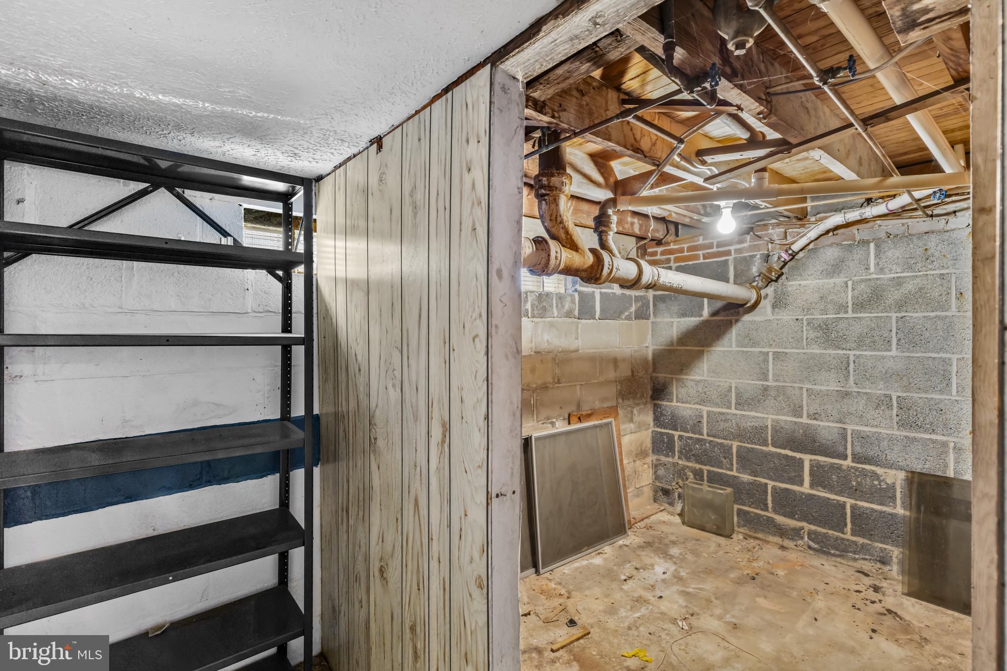7627 Carson Avenue Baltimore, MD 21224 - Photo 22 of 38 a bathroom with a shower