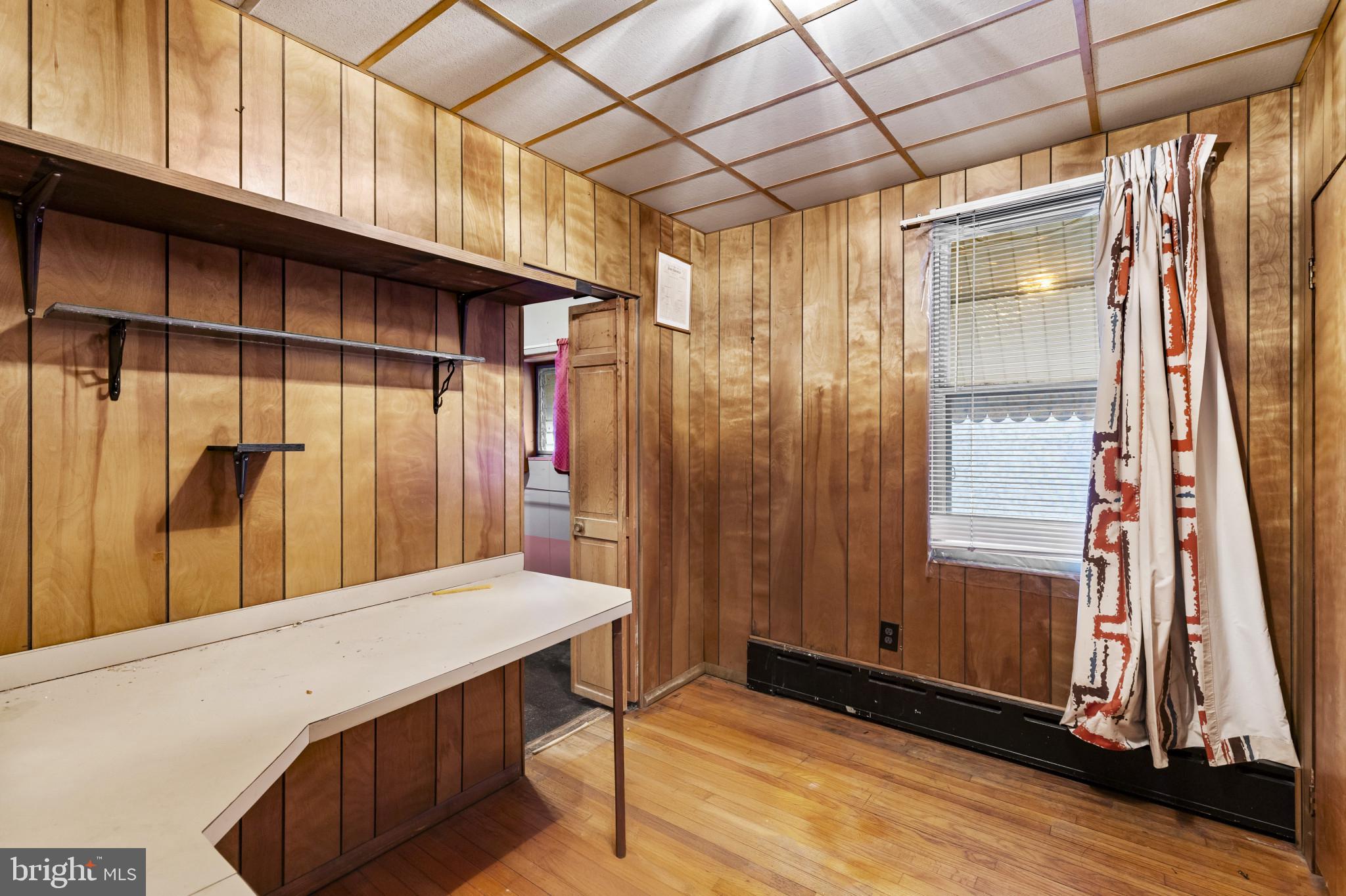 7627 Carson Avenue Baltimore, MD 21224 - Photo 5 of 38 a bathroom with a sink and a mirror