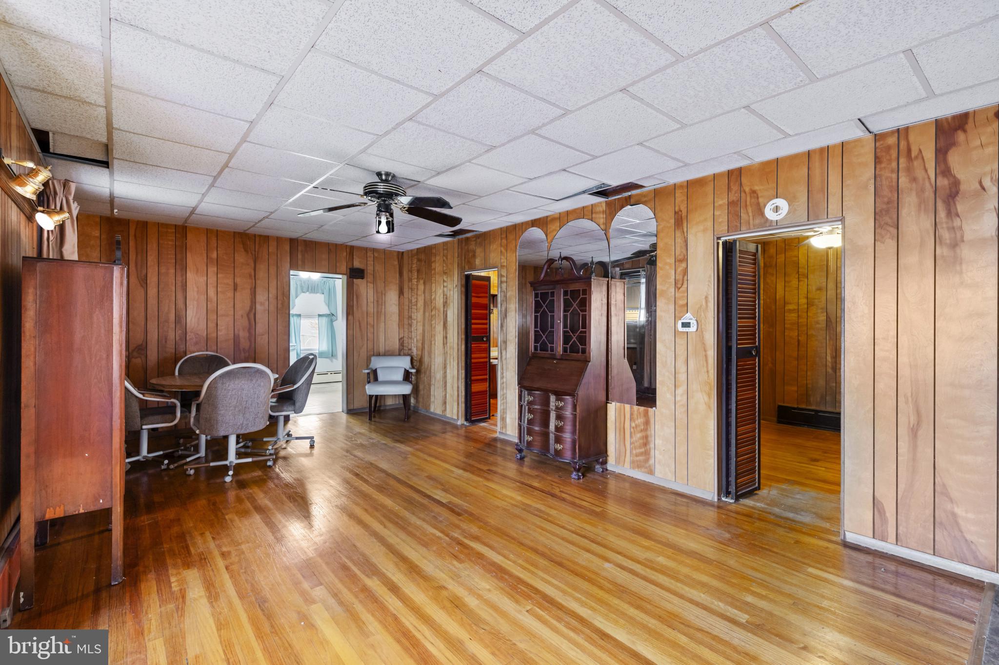 7627 Carson Avenue Baltimore, MD 21224 - Photo 10 of 38 a view of a room with gym equipment and wooden floor