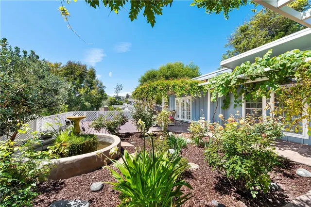 a view of a garden with patio