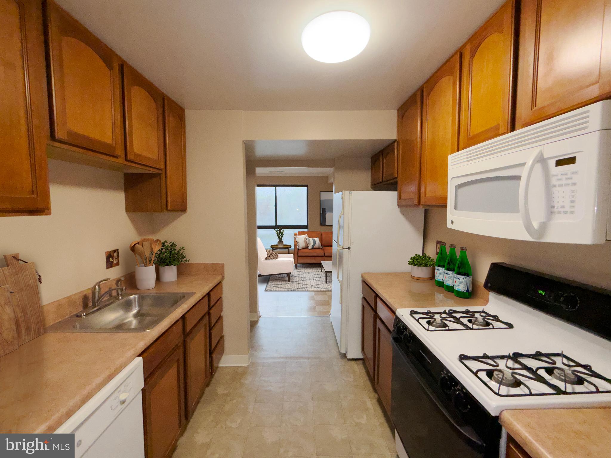 1601 Gainesville Street Southeast, Unit 201 Washington, DC 20020 - Photo 23 of 23 Virtually Staged Kitchen