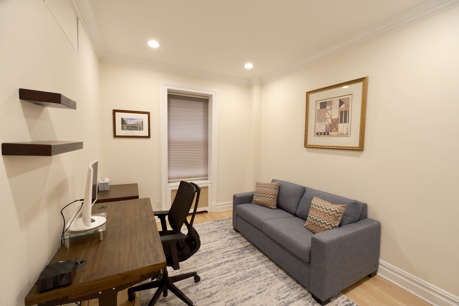311 West 97th Street, Unit 2W Manhattan, NY 10025 - Photo 12 of 15 a work room with furniture and a couch