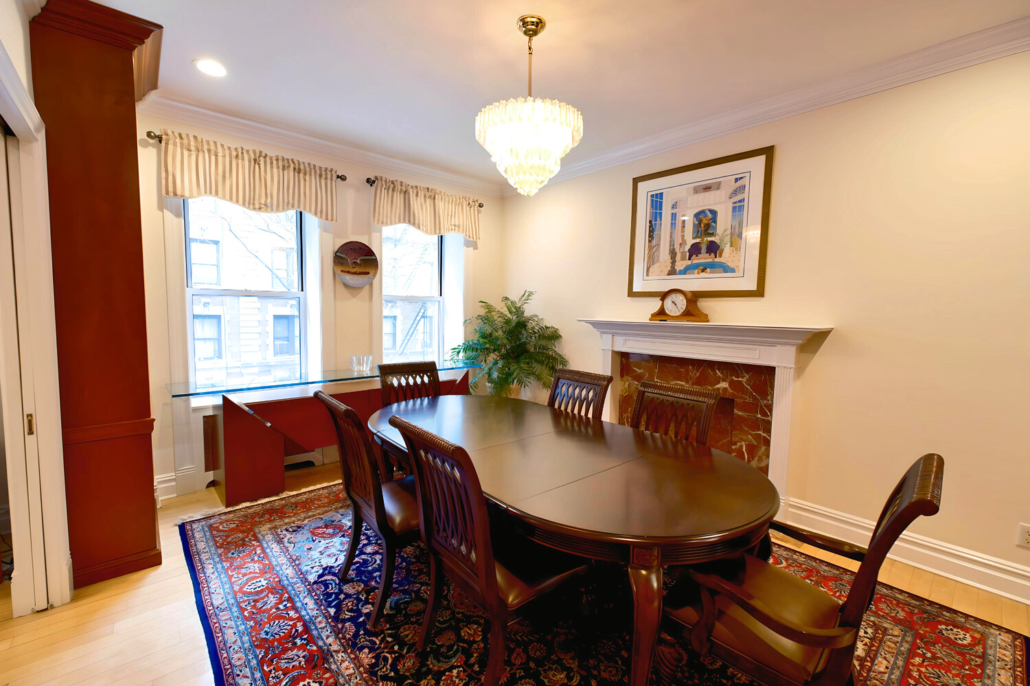 311 West 97th Street, Unit 2W Manhattan, NY 10025 - Photo 4 of 15 a dining room with furniture and window