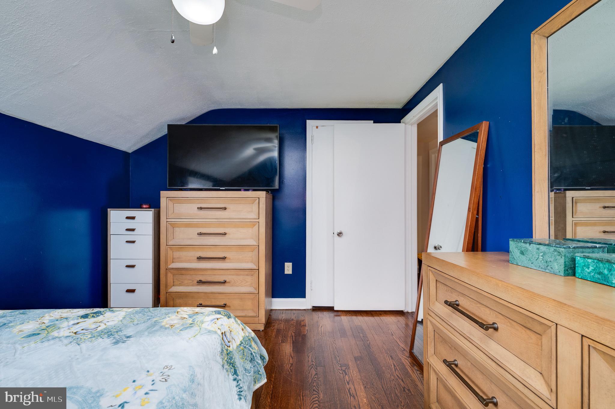 117 East Broad Street Reading, PA 19607 - Photo 16 of 33 a bedroom with a bed and a dresser