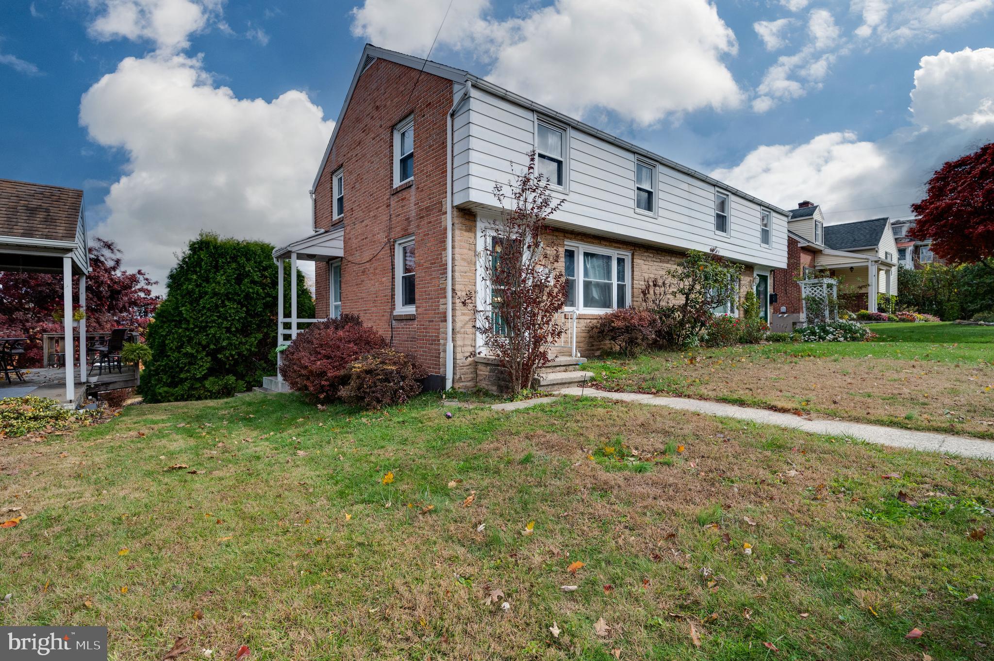 117 East Broad Street Reading, PA 19607 - Photo 2 of 33 a view of a house with a garden