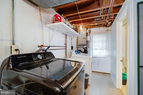 a kitchen with a stove and a microwave
