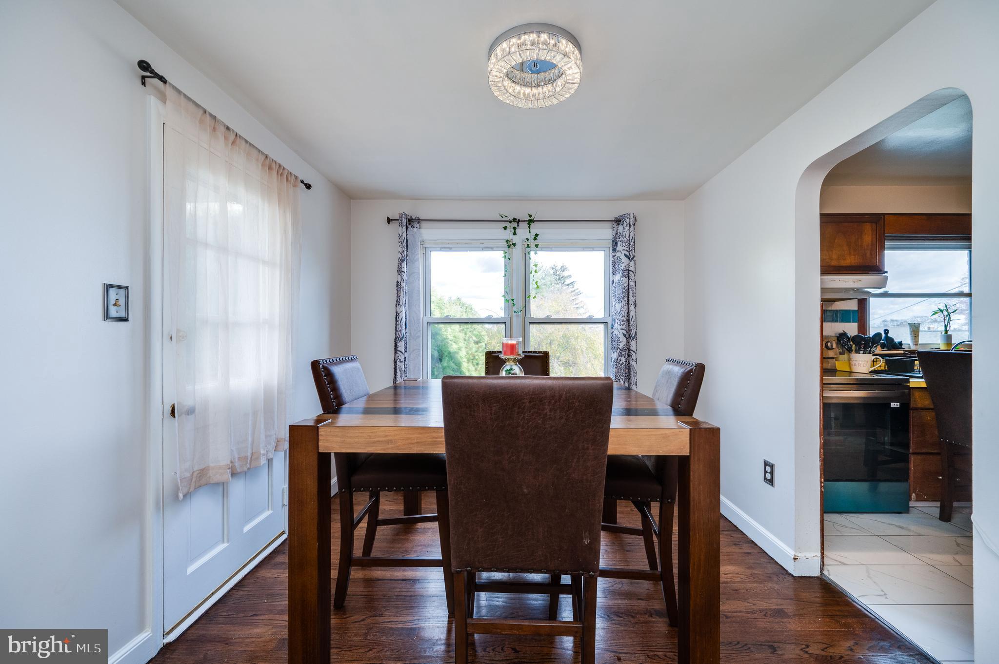 117 East Broad Street Reading, PA 19607 - Photo 10 of 33 a view of a dining room with furniture window and wooden floor