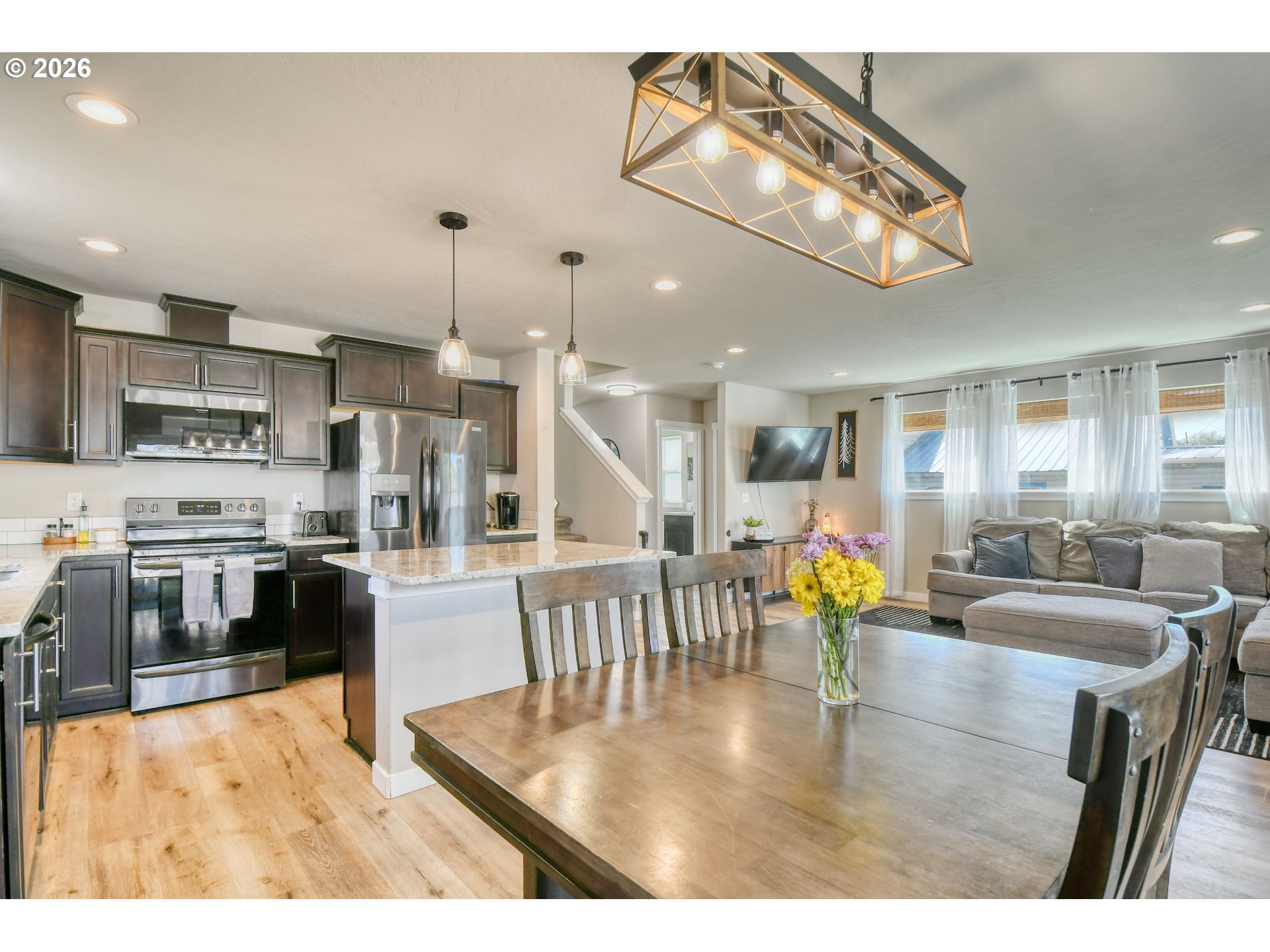 233 East Jefferson Street Athena, OR 97813 - Photo 10 of 36 a large kitchen with a table and chairs