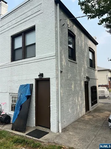 a front view of a house with a garage