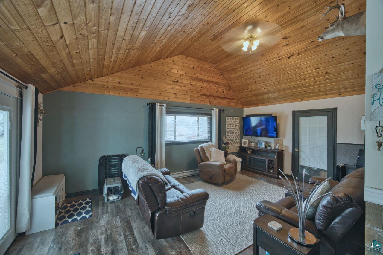 329 Wyandotte Road Hoyt Lakes, MN 55750 - Photo 10 of 52 Vaulted wood-paneled ceiling with central ceiling fan