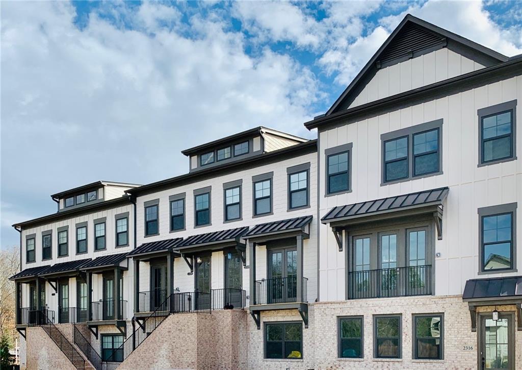 Welcome to Dumont Place! Beautiful, classic, Craftsman designed town homes with board & batten detailing.  Front balconies with rear entry garages and HUGE decks for entertaining.
