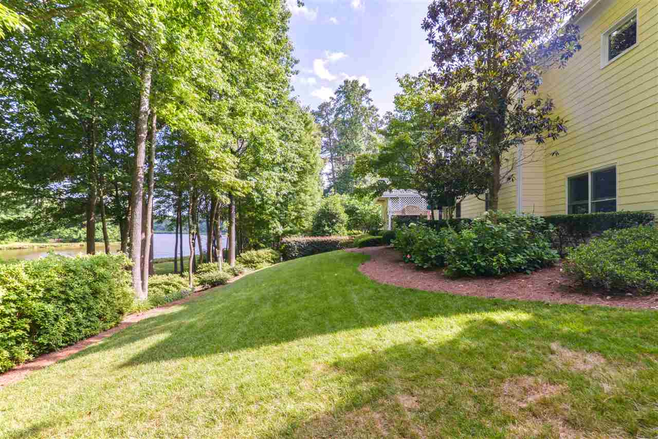 7608 Kelmscot Way Raleigh, NC 27615 - Photo 18 of 23 Professionally Landscaped Yard