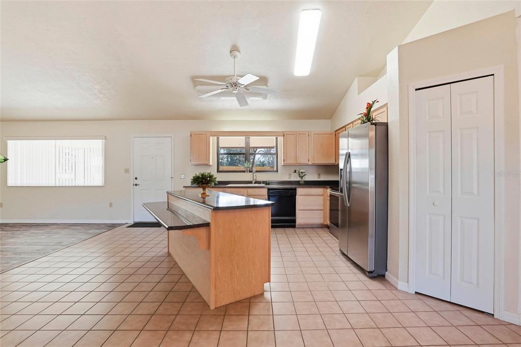 534 Southwest Thorne Lane Fort White, FL 32038 - Photo 21 of 51 a kitchen with stainless steel appliances a refrigerator sink and cabinets