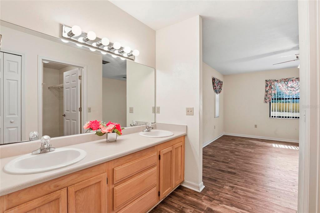 534 Southwest Thorne Lane Fort White, FL 32038 - Photo 32 of 51 a bathroom with a double vanity sink and a mirror