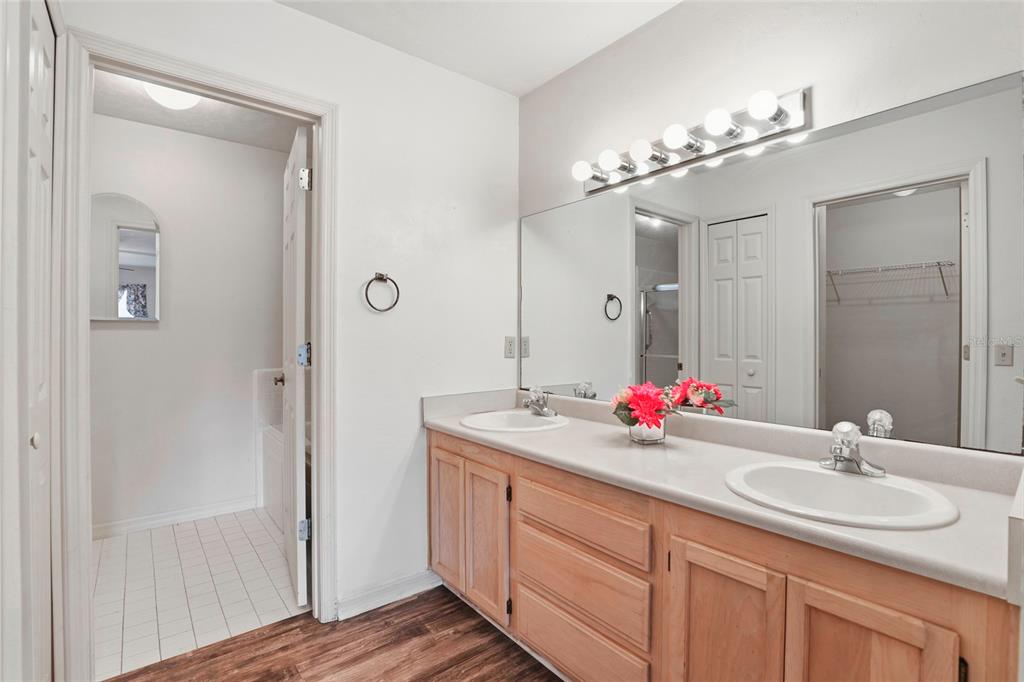 534 Southwest Thorne Lane Fort White, FL 32038 - Photo 33 of 51 a bathroom with a sink vanity tub and shower