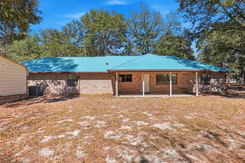 534 Southwest Thorne Lane Fort White, FL 32038 - Photo 41 of 51 a house with a yard
