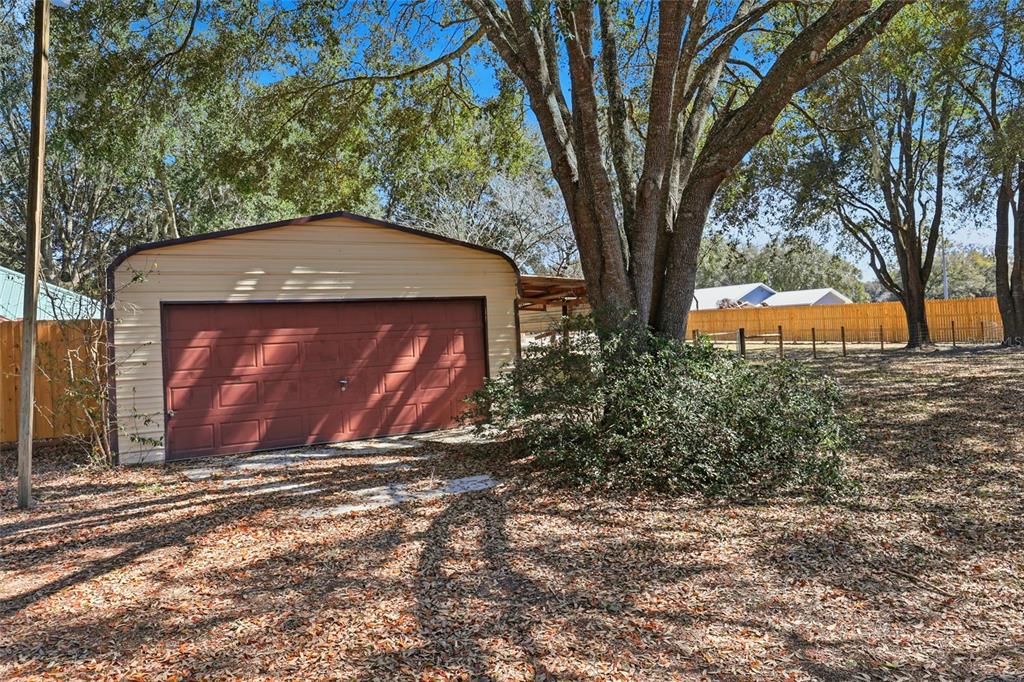 534 Southwest Thorne Lane Fort White, FL 32038 - Photo 44 of 51 a front view of a house with a yard
