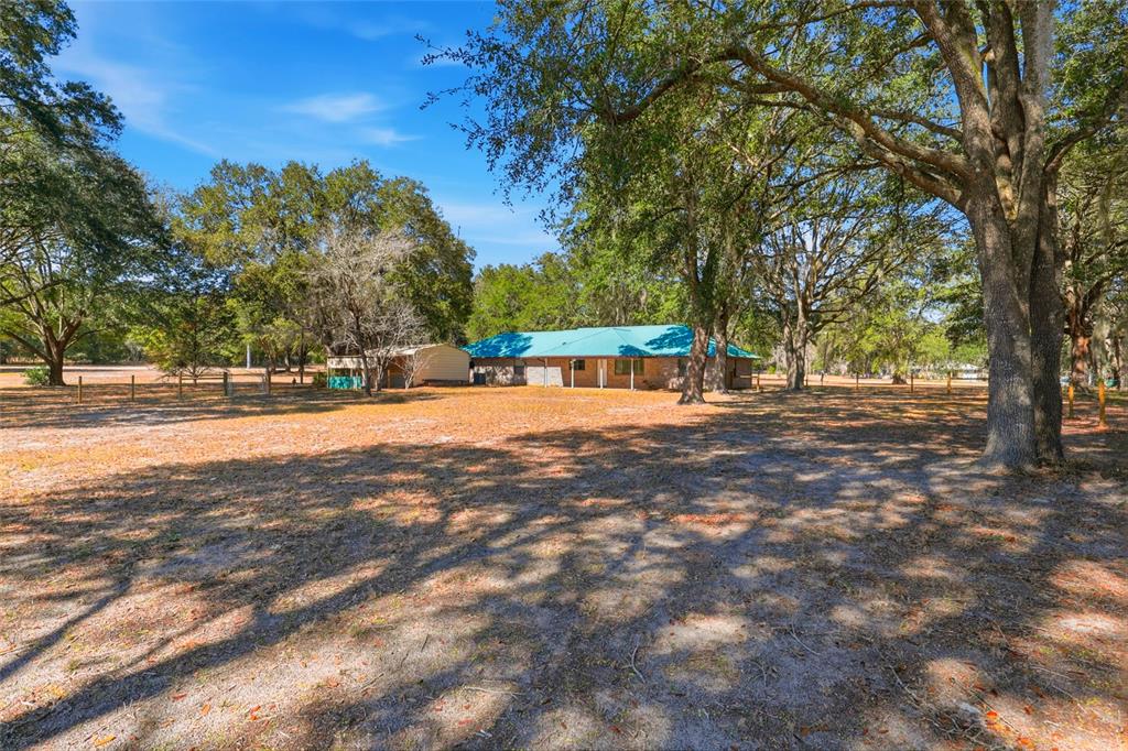 534 Southwest Thorne Lane Fort White, FL 32038 - Photo 48 of 51 a view of outdoor space with garden and trees
