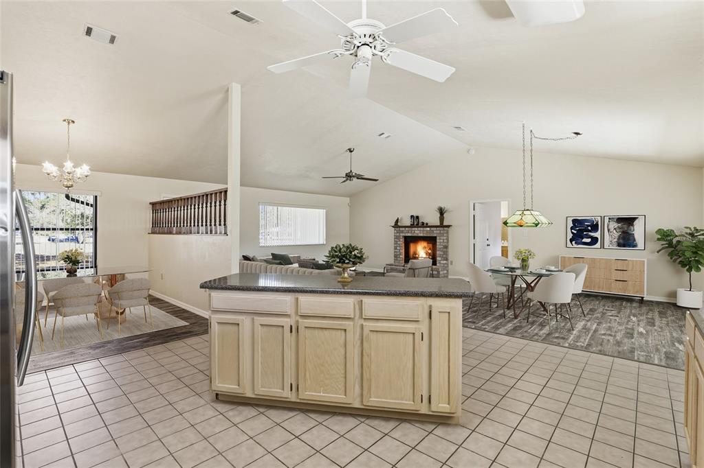 534 Southwest Thorne Lane Fort White, FL 32038 - Photo 7 of 51 a kitchen with granite countertop a sink a stove and cabinets