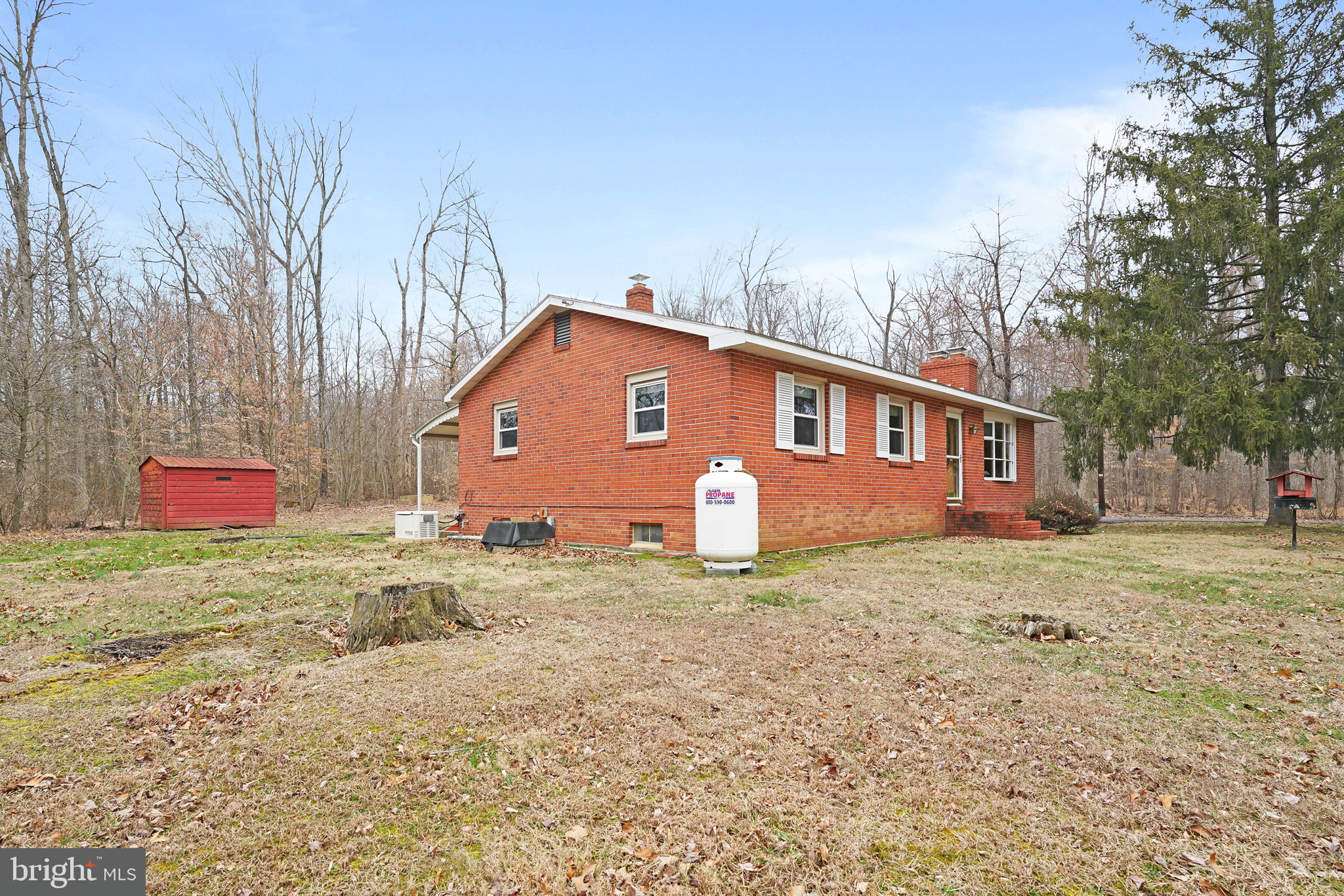249 Washington Schoolhouse Road Rising Sun, MD 21911 - Photo 5 of 24 a front view of a house with a yard