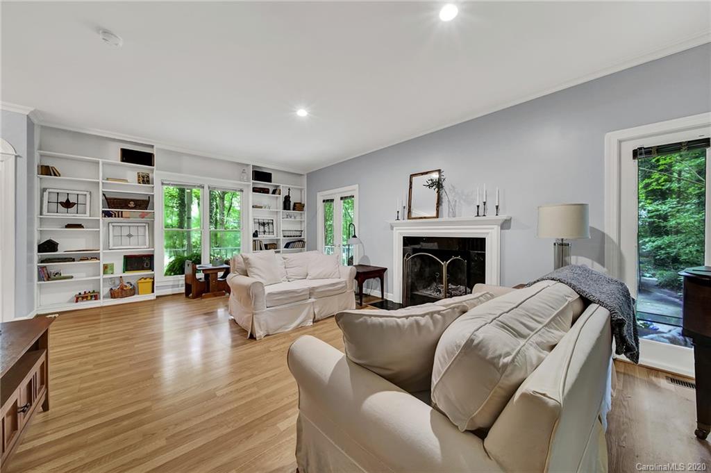 2685 Farmstead Lane, Unit 2685 Fort Mill, SC 29708 - Photo 11 of 30 a living room with furniture large window and a fireplace