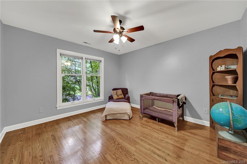 2685 Farmstead Lane, Unit 2685 Fort Mill, SC 29708 - Photo 25 of 30 a living room with furniture and a window