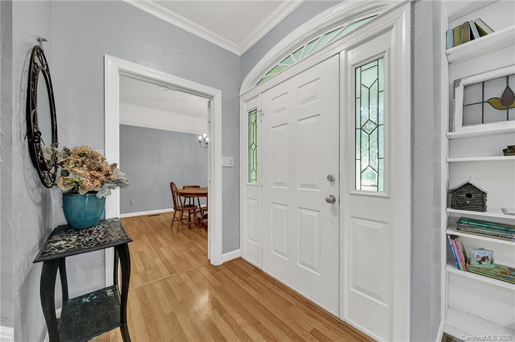 2685 Farmstead Lane, Unit 2685 Fort Mill, SC 29708 - Photo 8 of 30 a dining room with furniture and wooden floor