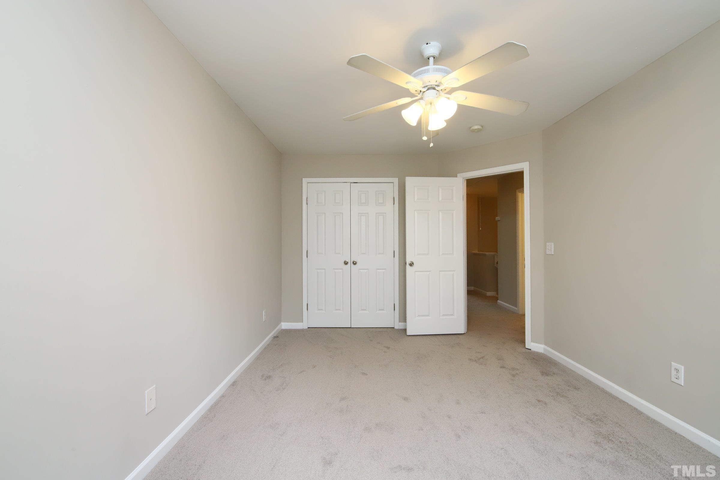 8205 Martello Lane Raleigh, NC 27613 - Photo 22 of 28 a view of an empty room with a window